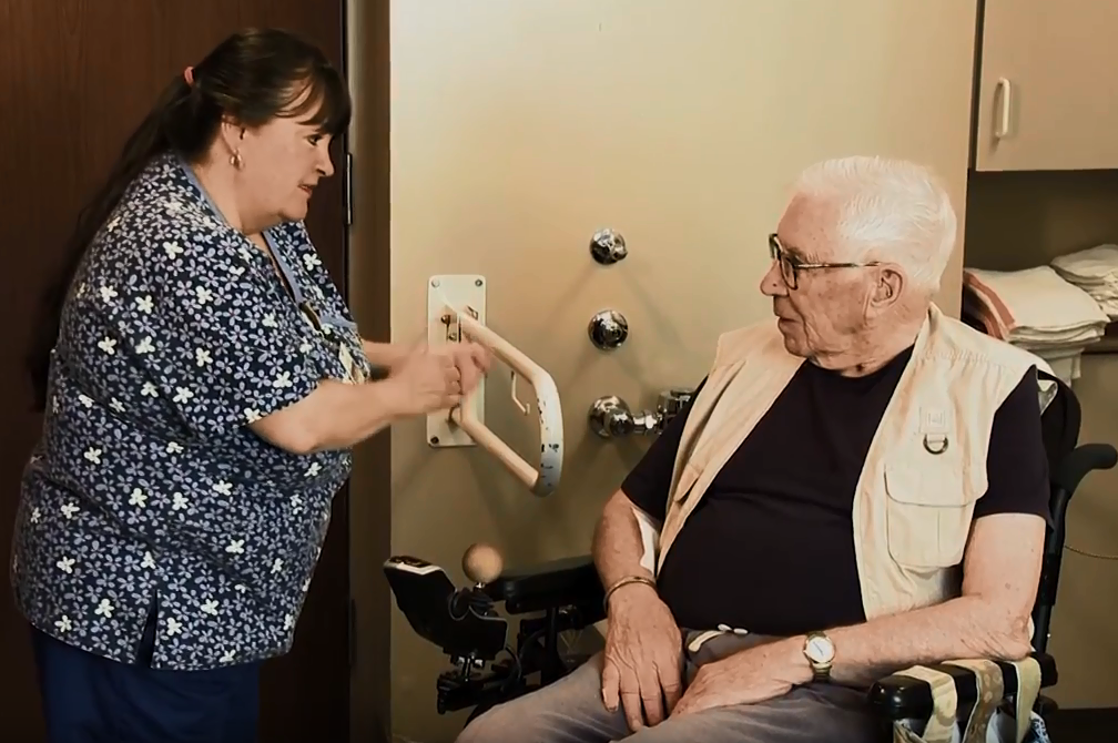 sandie caring for resident, photograph