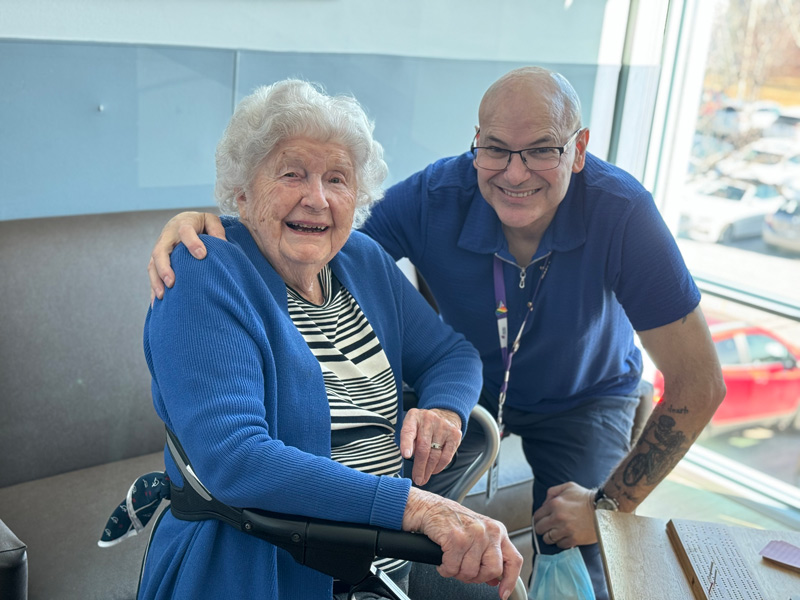 Lucile Lane, Veteran and Perley Health Resident, shares a moment with Veteran Volunteer Tony Cobden during a game of cribbage.